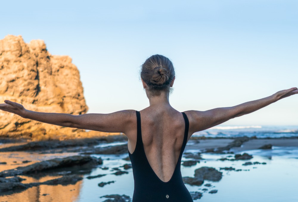 pilates exercise by the ocean