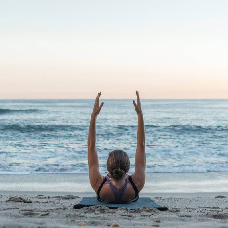 pilates exercise on beach